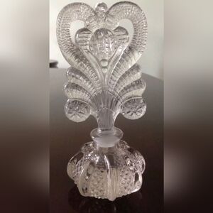 Antique crystal Perfume bottles with crystal stoppers.